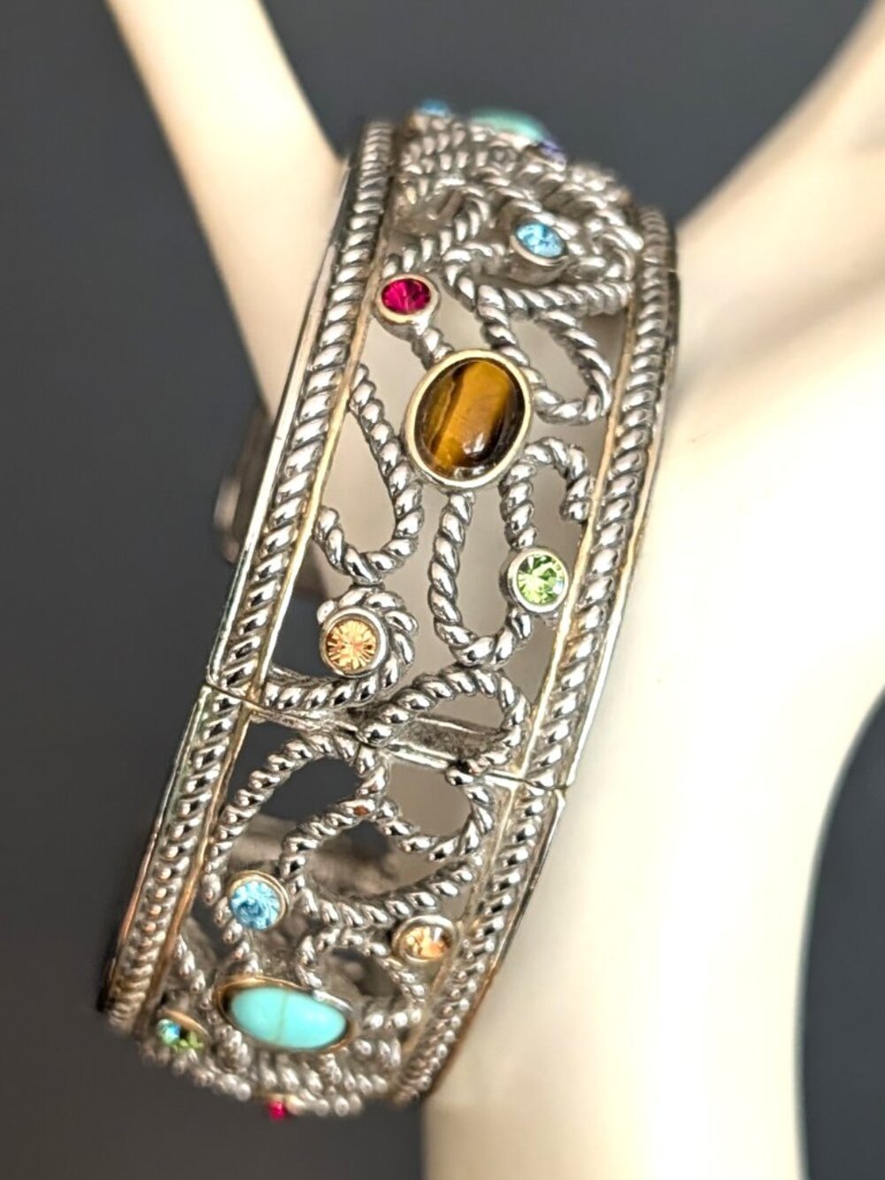 Silver tone cuff with crystal and faux stone accents